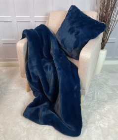 Luxury blue fur blanket with blue fur cushion