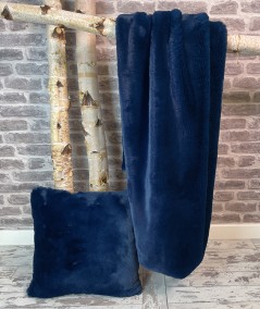 Blue faux throw with faux cushion