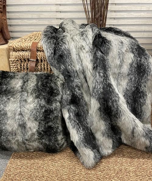 Black and grey striped faux fur blanket