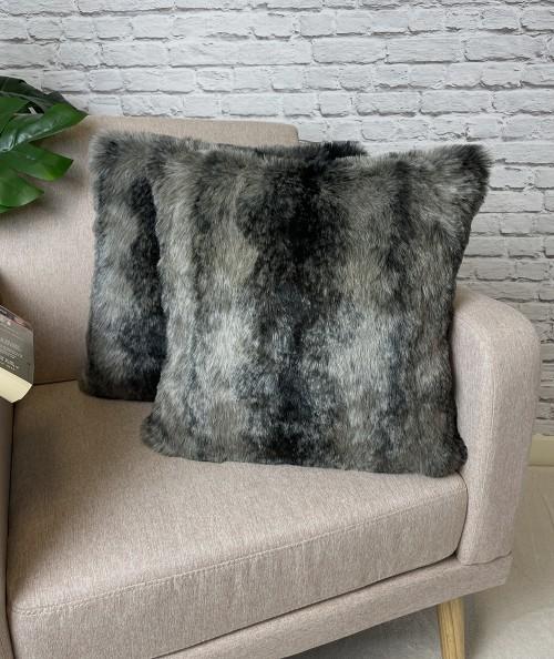 Fur cushion covers in grey and black stripes