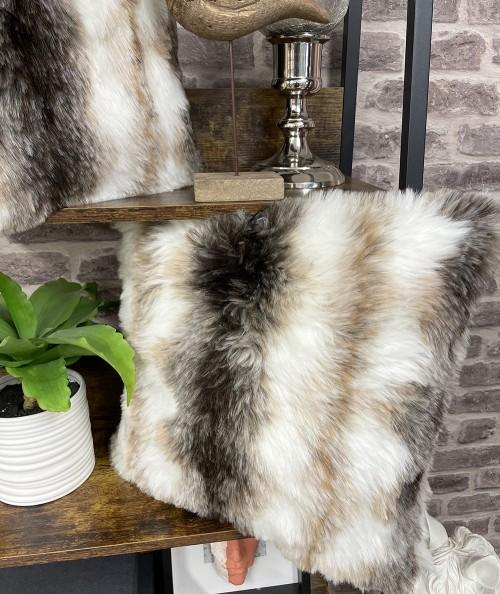 White and brown striped faux fur cushions