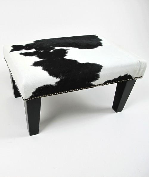 Small rectangular black and white hair on hide footrest 316