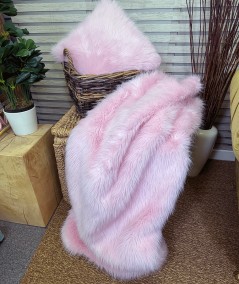 Luxury pale pink faux fur throws