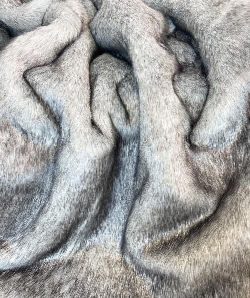 Two-tone medium length grey faux fur fabric